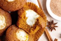 Pumpkin Cream Cheese Muffins with a Creamy Swirl
