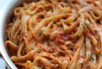 Creamy Tomato Fettuccine Recipe with Garlic, Basil and Parmesan