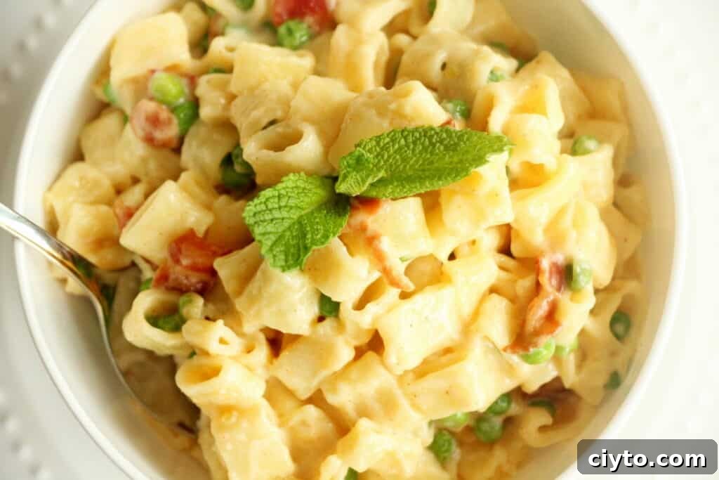 Creamy Bacon Mac and Cheese Recipe 4 macaroni and cheese in white bowl