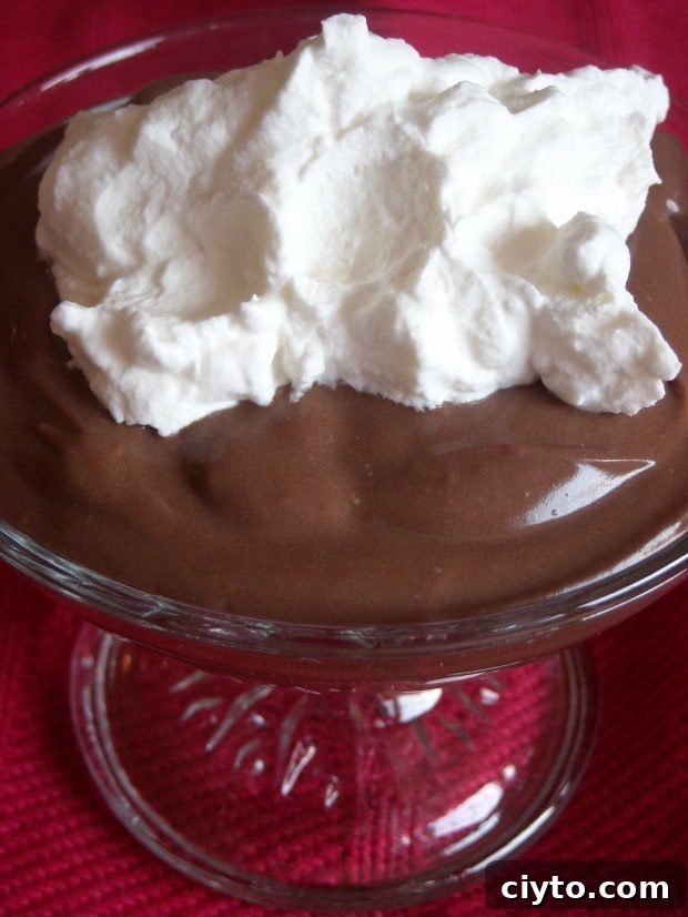This delicious homemade chocolate pudding is packed full of rich chocolate flavor and is simply made on the stove top. Serve it warm or cold.