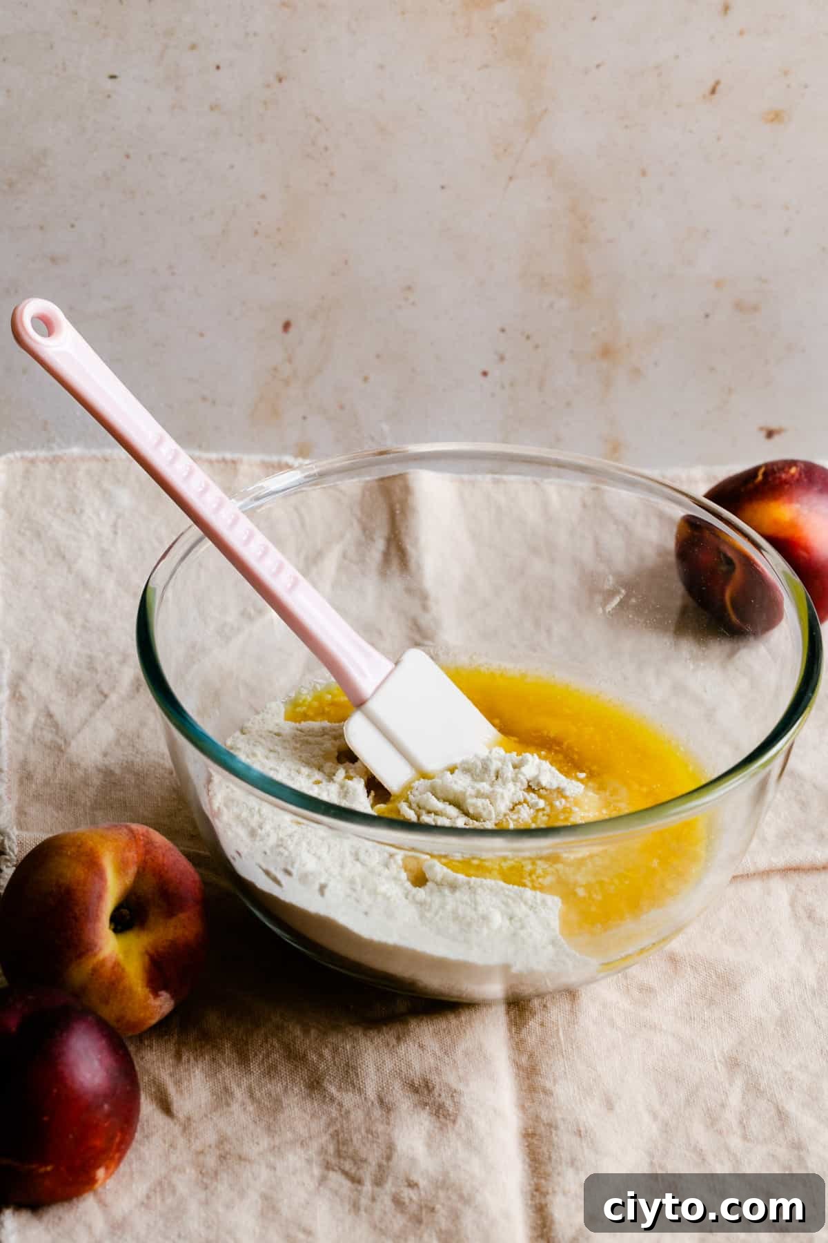 a bowl with flour and melted butter