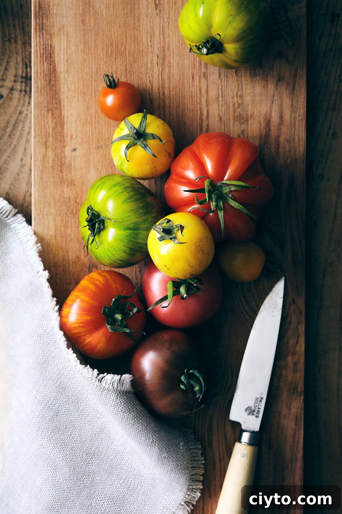 Heirloom tomatoes on a cutting board