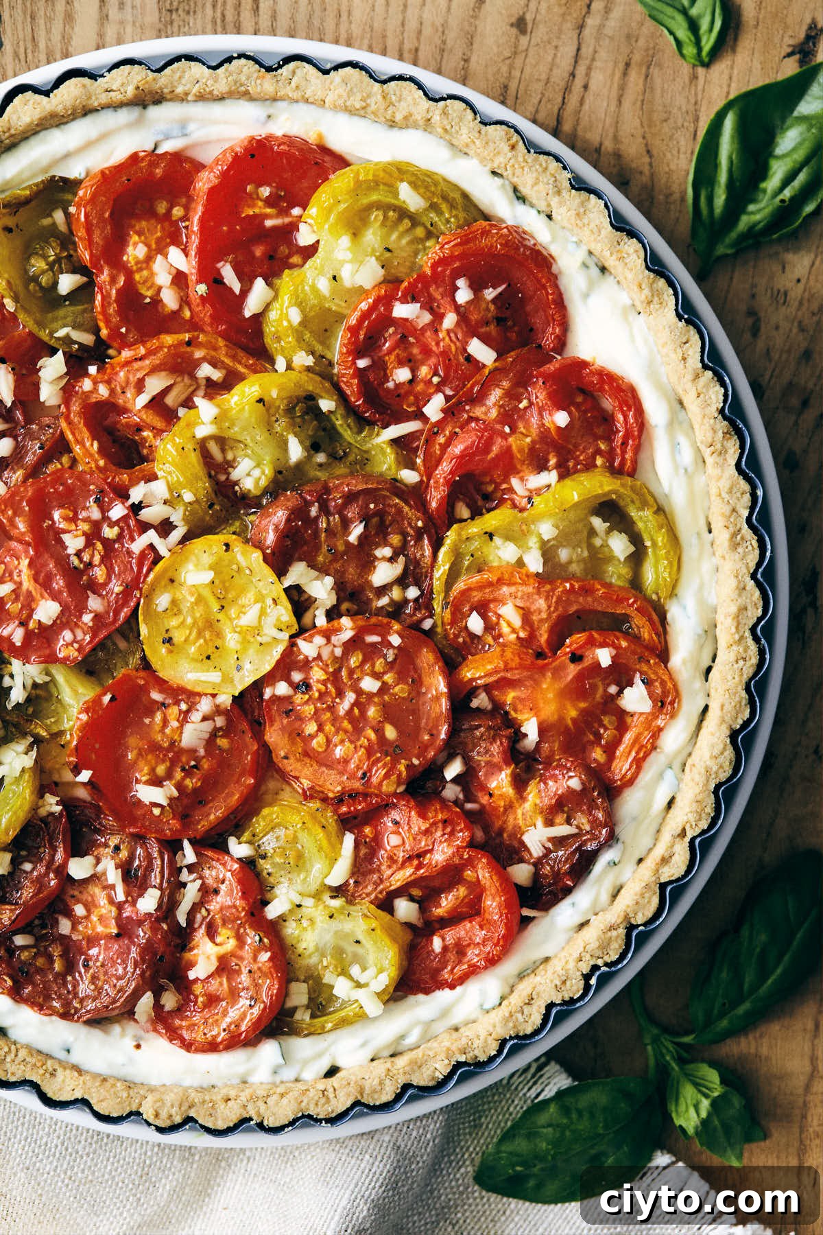 Heirloom tomato tart in a baking pan before going into oven