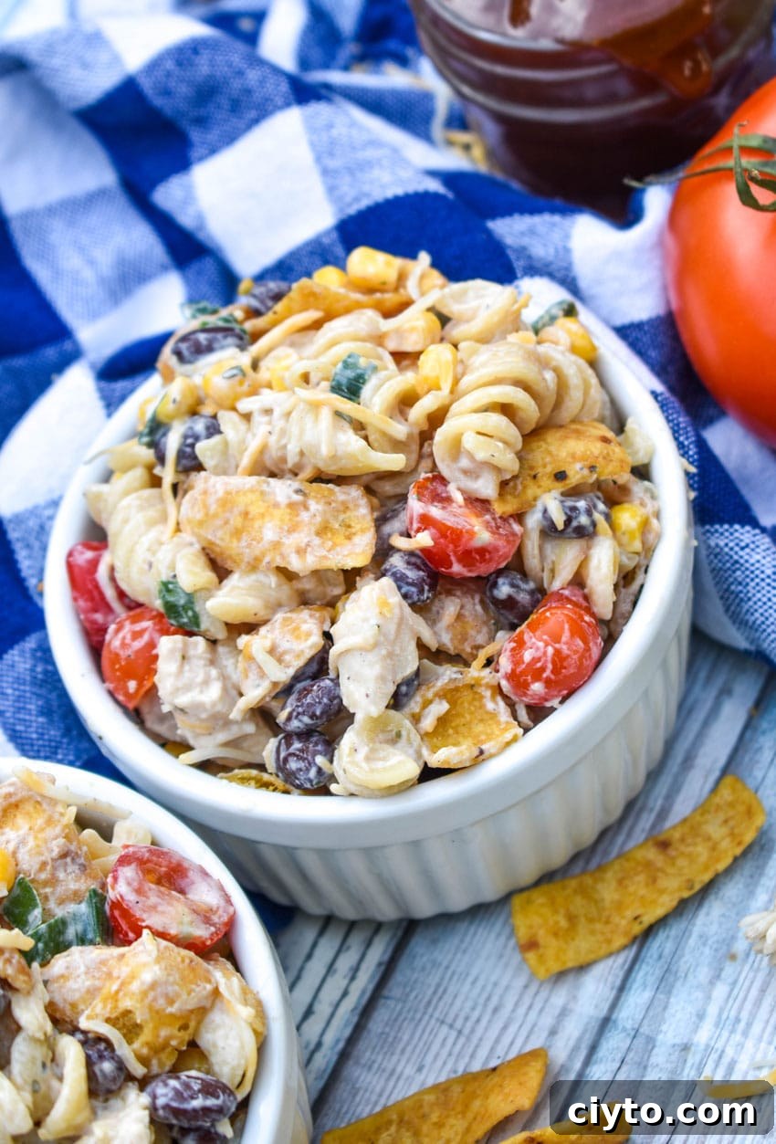 barbecue chicken pasta salad in two small white ramekins