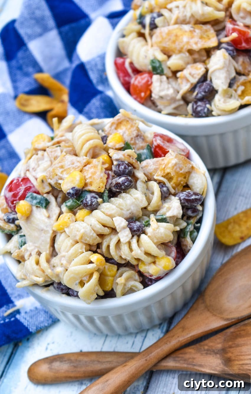 barbecue chicken pasta salad in two small white ramekins