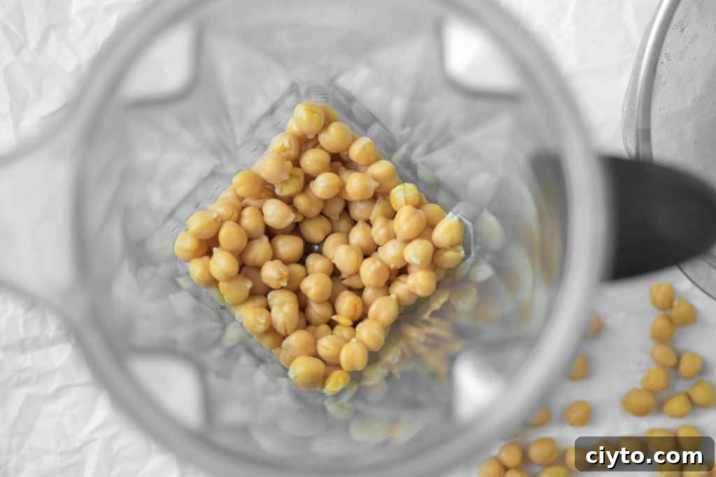 How to Make Creamy Homemade Hummus 4 chickpeas in a vitamix blender container