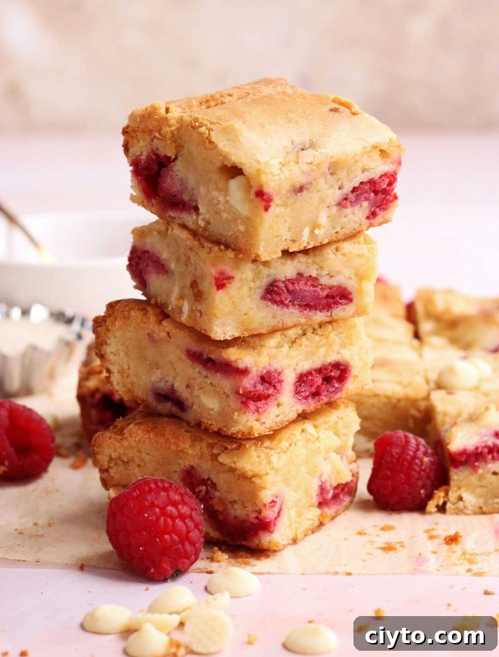 white chocolate raspberry blondies stacked