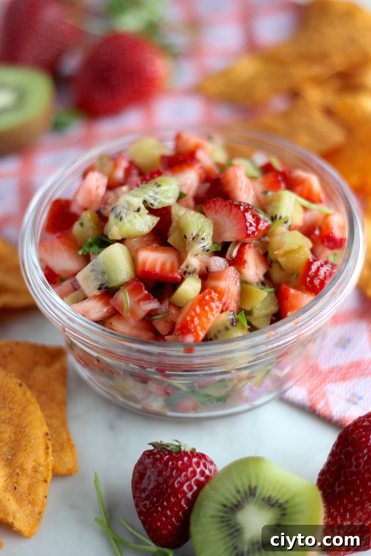 Strawberry Kiwi Fruit Salsa - a fresh, colorful fruit salsa full of flavor from strawberry, kiwi, lime, and cilantro! | fedandfulfilled.com
