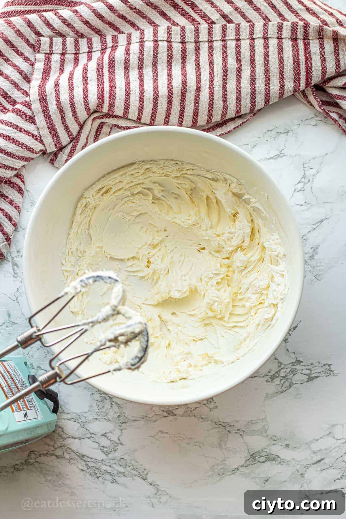 Whipping cream in a bowl.