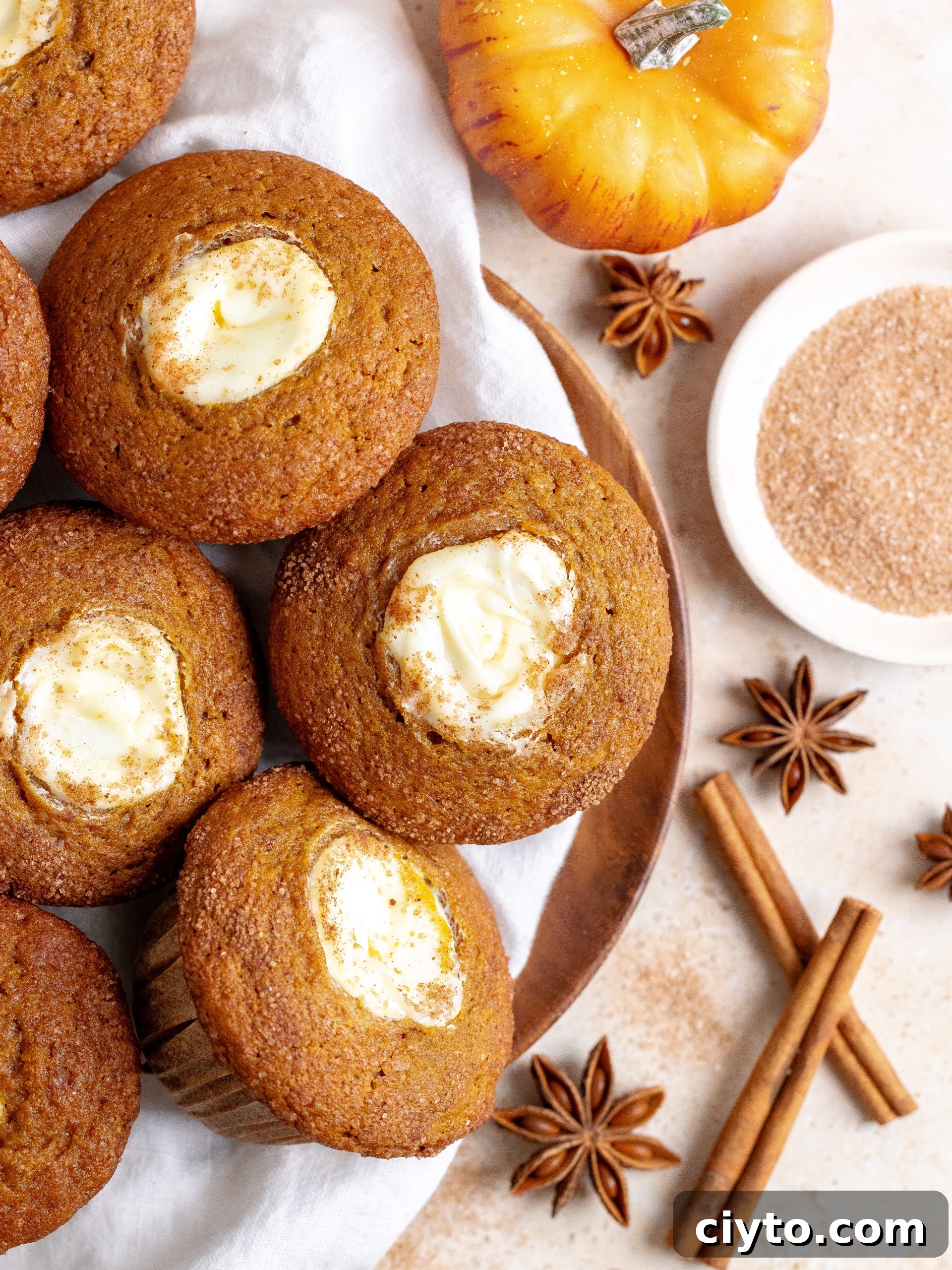 Soft pumpkin muffins with cream cheese filling