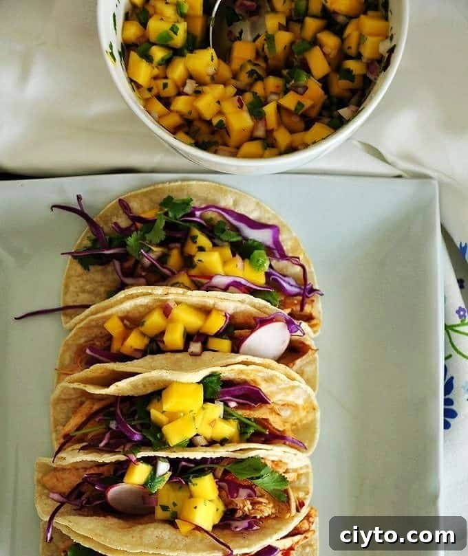 Smoky chicken tacos with mango pico de gallo