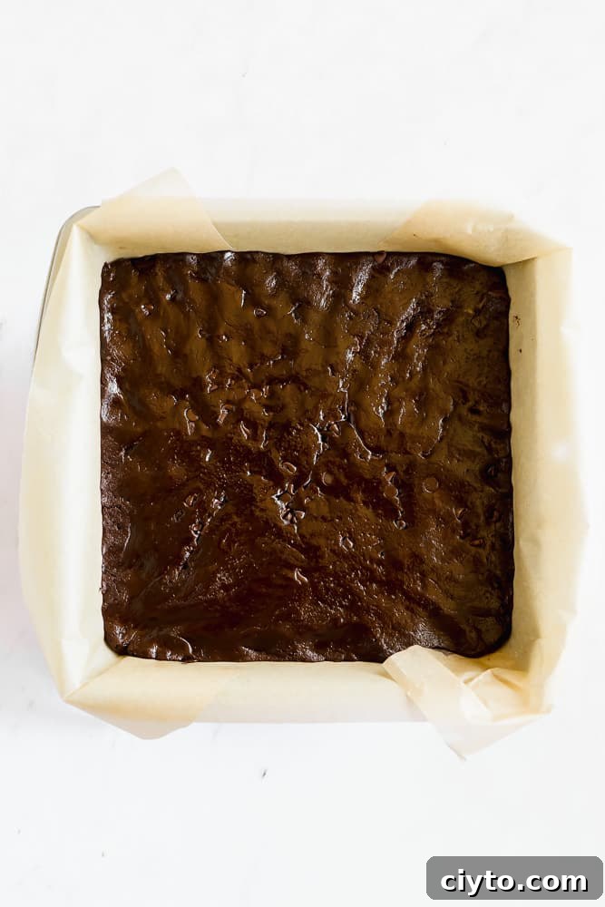 brownie batter in a pan before baking
