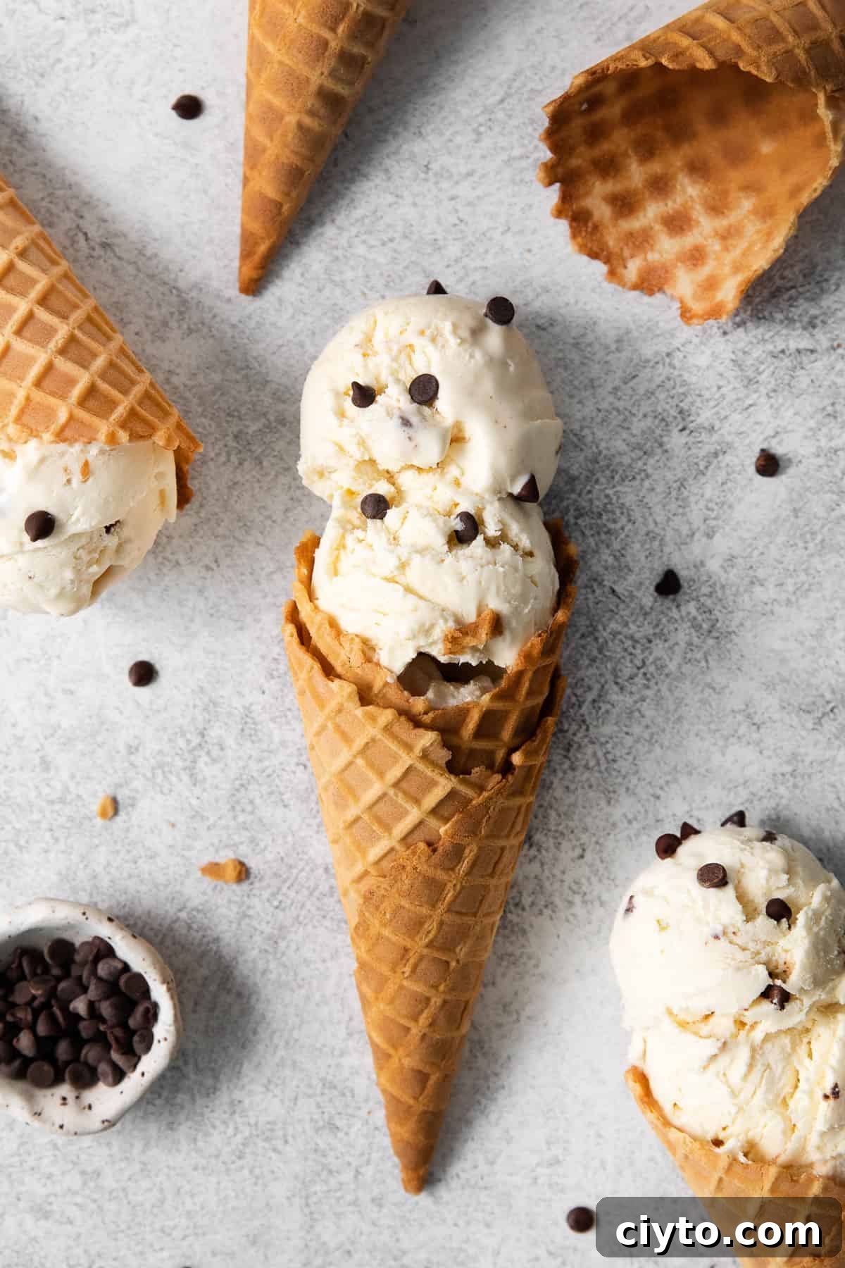 Cannoli Ice Cream Recipe with Ricotta and Chocolate Chips 8 Three ice cream cones ready to be filled with cannoli ice cream.