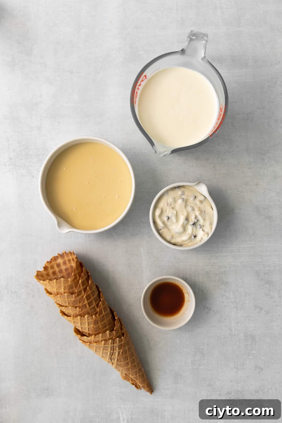 Cannoli Ice Cream Recipe with Ricotta and Chocolate Chips 3 Bowls of ricotta, cream cheese, and other ingredients for cannoli ice cream.