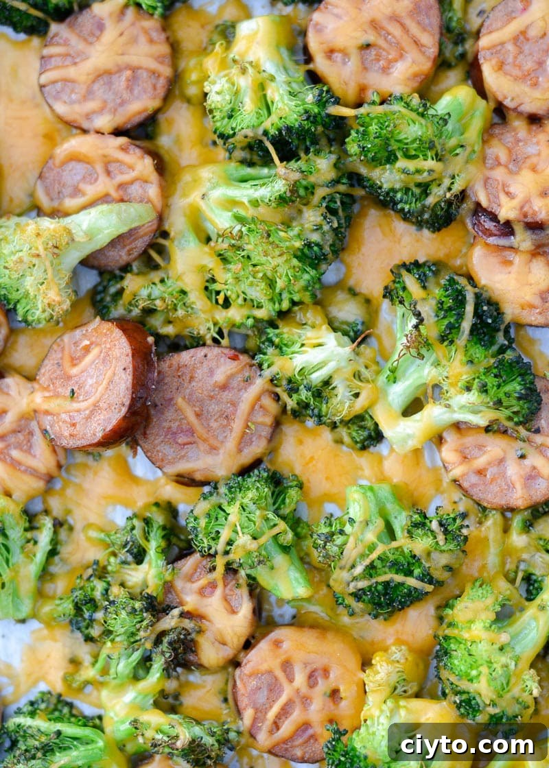 This Sausage Broccoli Cheddar Sheet Pan is the perfect easy weeknight meal! This meal includes four generous servings for less than 7 net carbs each!