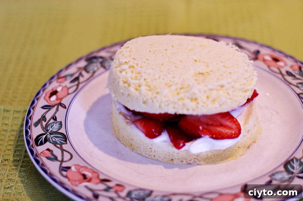 Adding the top shortcake half.
