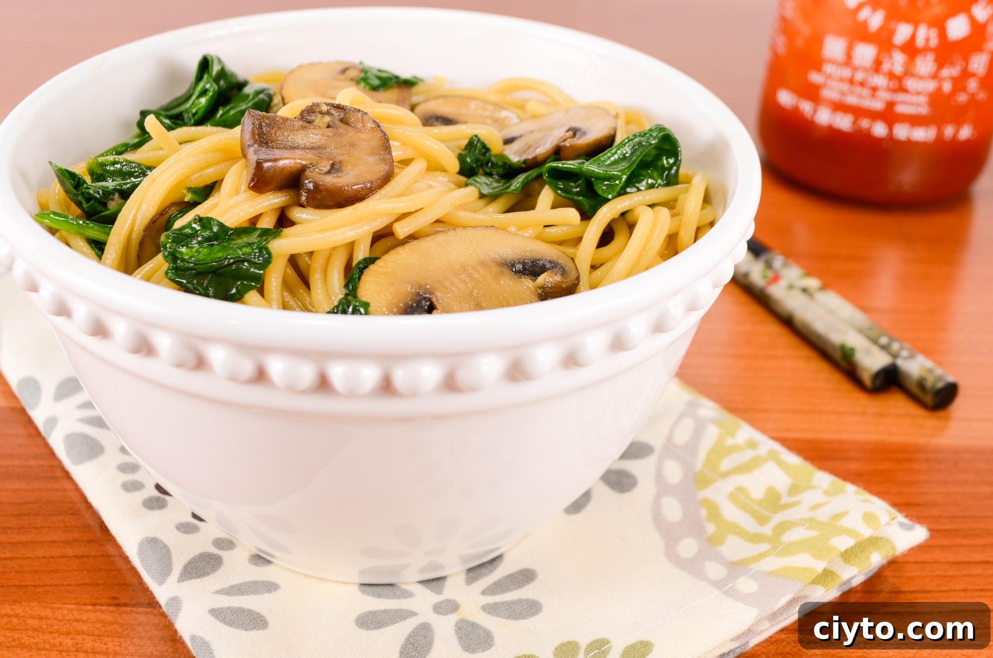 Mushroom and spinach garlic noodles close-up