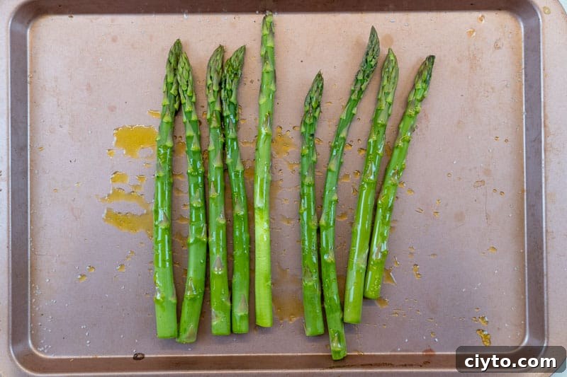 Oven-Roasted Asparagus with Balsamic Glaze 3 Arranging the asparagus on a baking tray