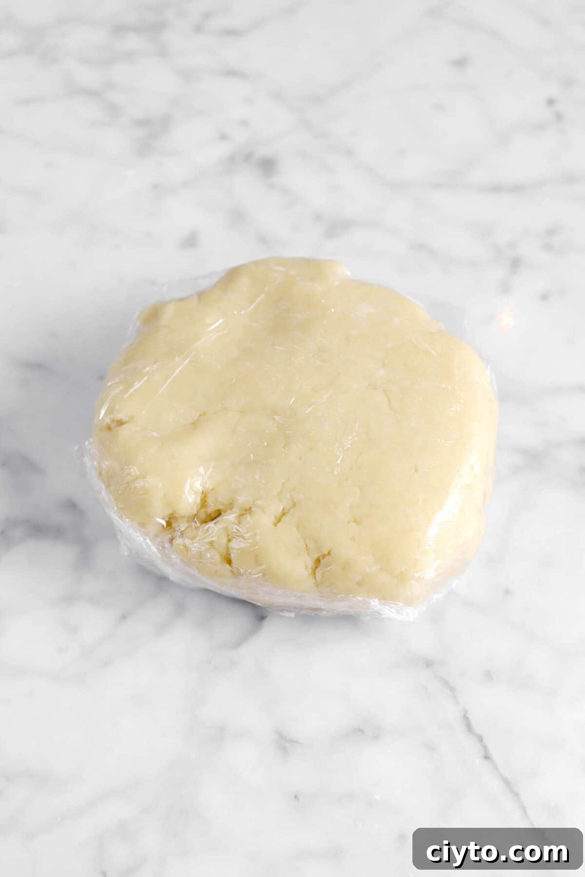 pie dough wrapped in plastic wrap