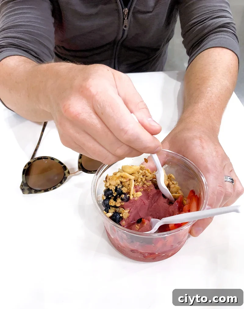eating an acai bowl