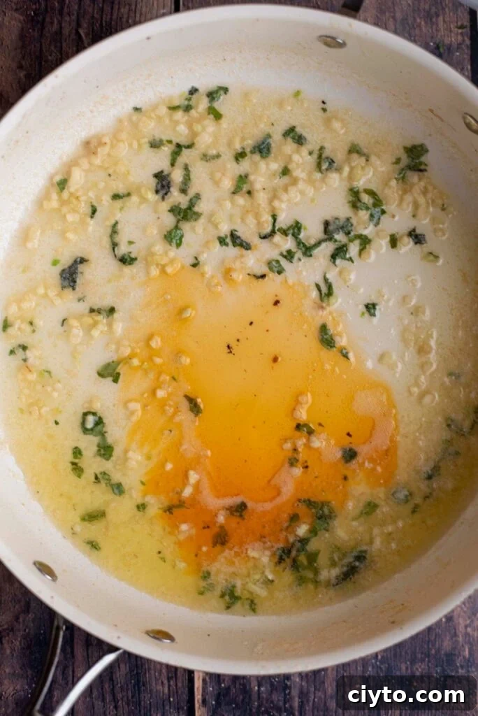 ingredients in a large pan for lemon basil sauce