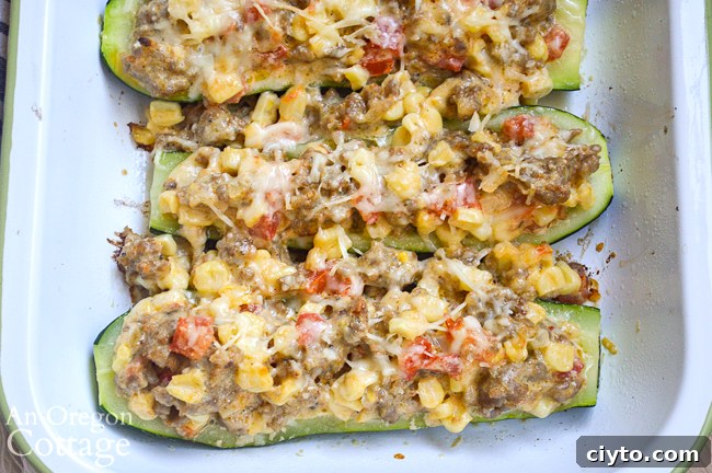 stuffed zucchini above in white pan