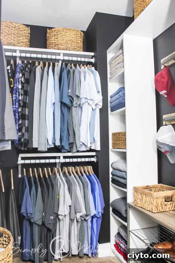 diy walk in closet makeover two hanging rods with clothes hanging on hangers on back wall and shelf unit with folded clothing storage on left baskets on top shelves of closets