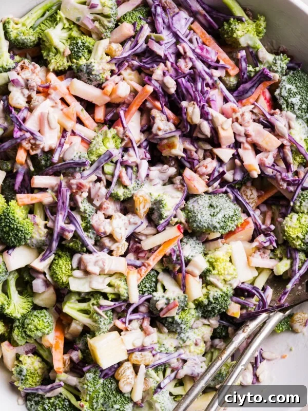 Broccoli crunch salad mixed in a bowl.