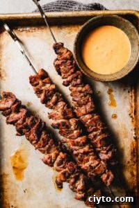 grilled lamb skewers on sheet pan vertical
