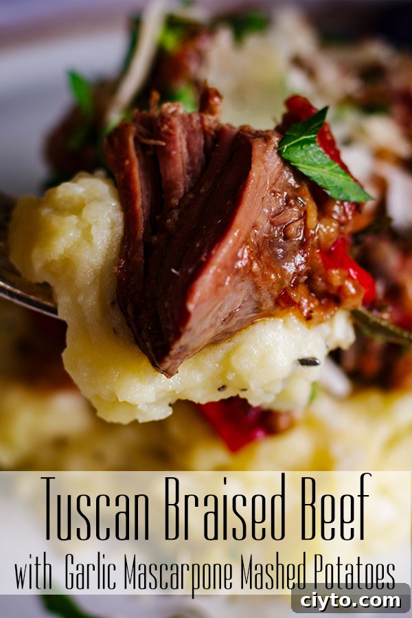 Slow-Braised Tuscan Beef with Garlic Mascarpone Mashed Potatoes 16 Taking a bite of Tuscan Braised Beef with Garlic Mascarpone Mashed Potatoes