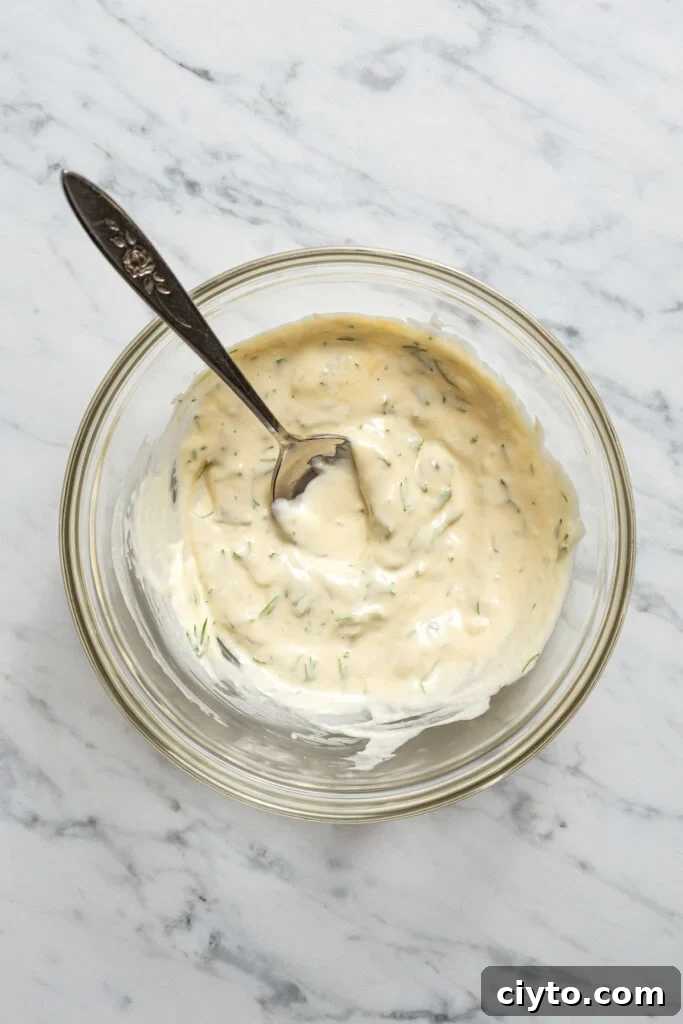 Whisk together the dill, dijon, and mayo. Whisk together the dill, dijon, and mayo.