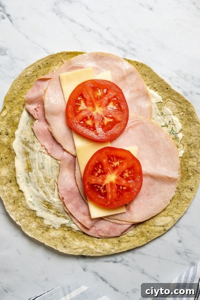Add cheese and tomato slices. Add cheese and tomato slices.