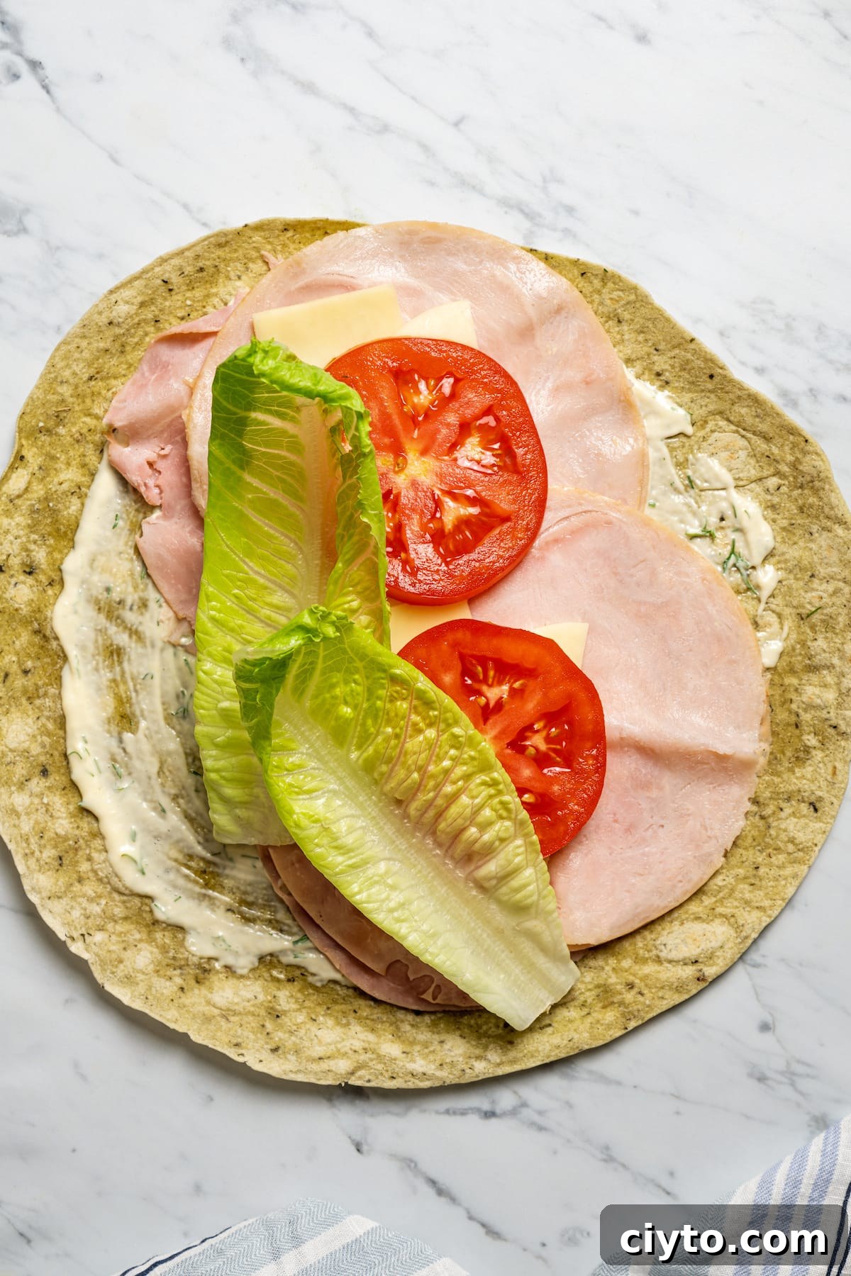 Add the romaine lettuce. Add the romaine lettuce.
