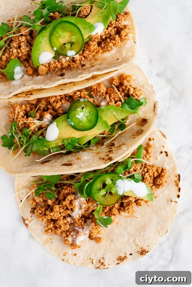 Quick Vegan Tofu Tacos Recipe for Weeknights 4 three tofu tacos with garnish