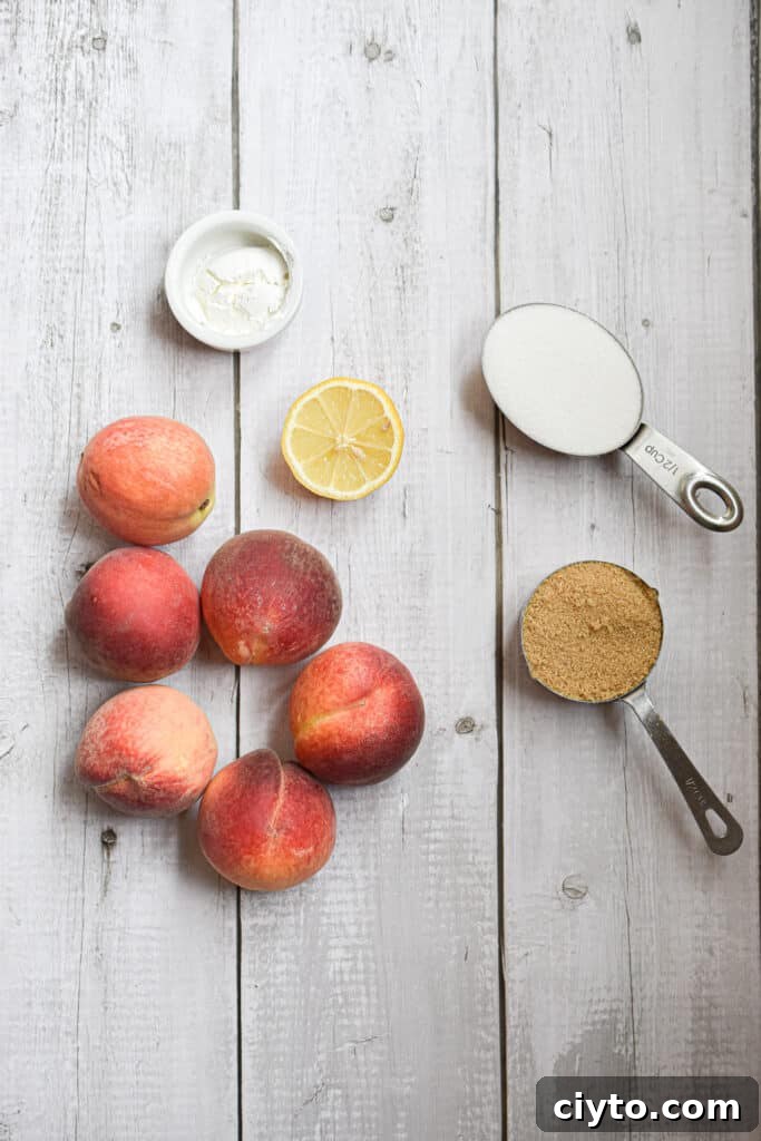 Homemade Instant Pot Peach Jam Recipe 3 Ingredients laid out on a white wooden background