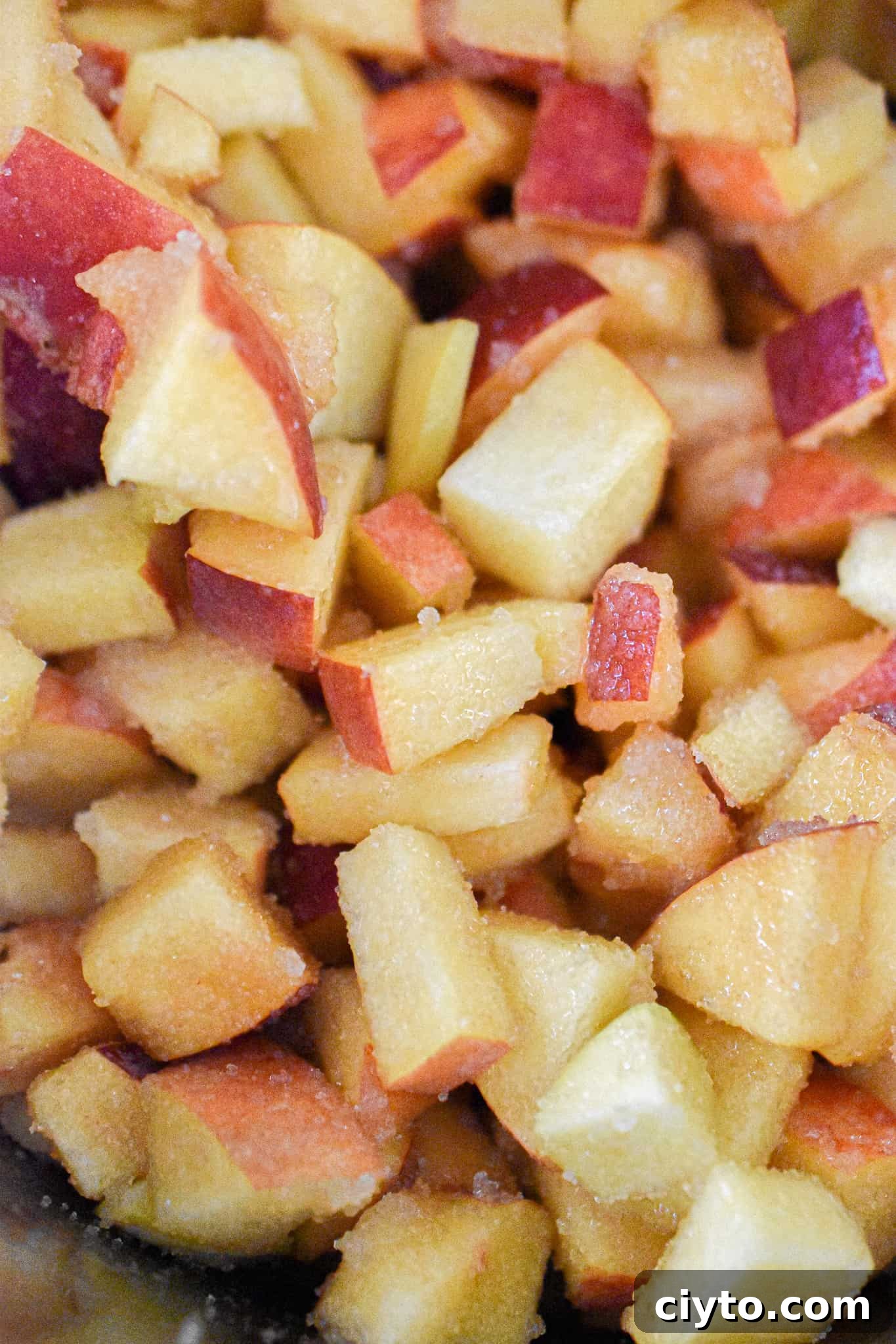 Homemade Instant Pot Peach Jam Recipe 5 A close up of the chopped peached in the Instant Pot