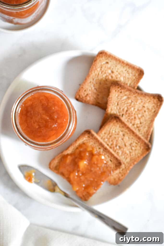 Homemade Instant Pot Peach Jam Recipe 9 An overhead shot of the Instant Pot Peach Jam in a jar
