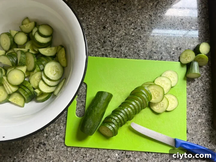 sliced cucumbers for cucumber onion salad