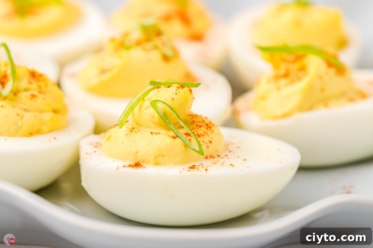 Classic Deviled Eggs Recipe for Parties and Holidays 11 deviled eggs on a plate