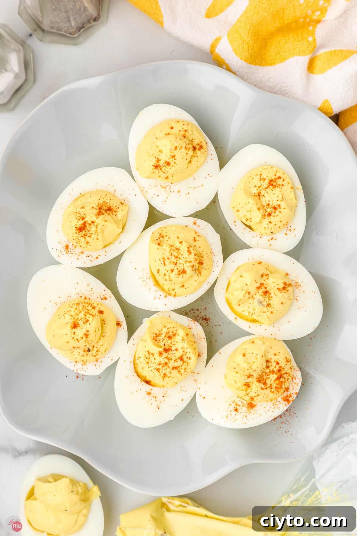 Classic Deviled Eggs Recipe for Parties and Holidays 8 deviled eggs on an egg plate