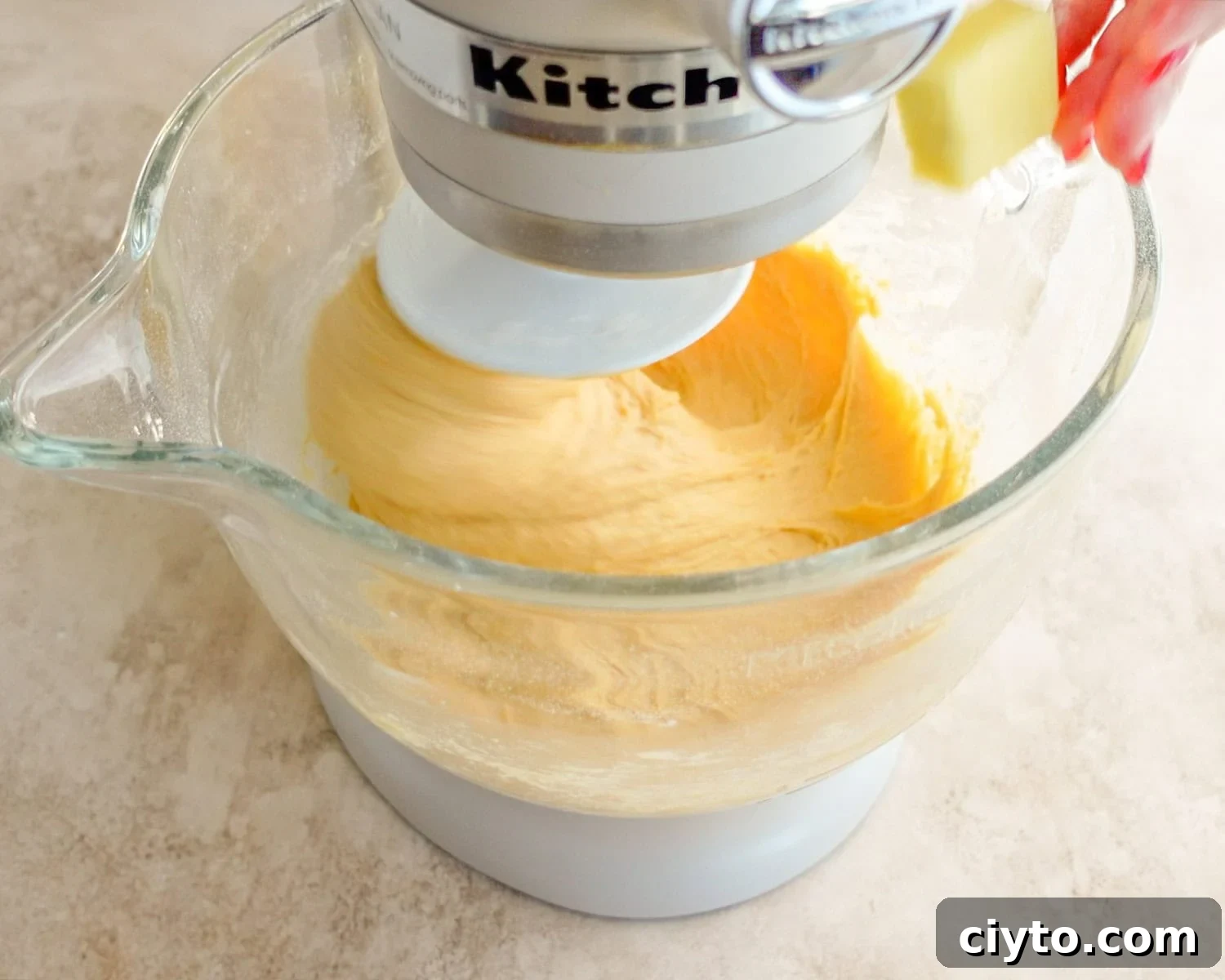 Add butter one tablespoon at a time.