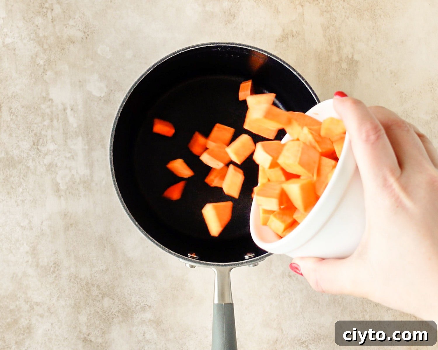 Add sweet potatoes to a small saucepan.