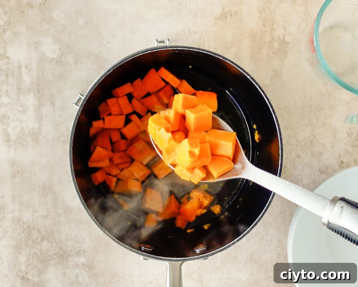 Remove cooked sweet potato with a slotted spoon.