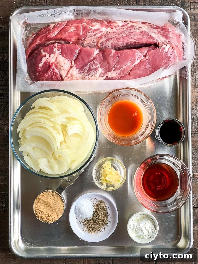 A tray filled with different types of food, with Pork