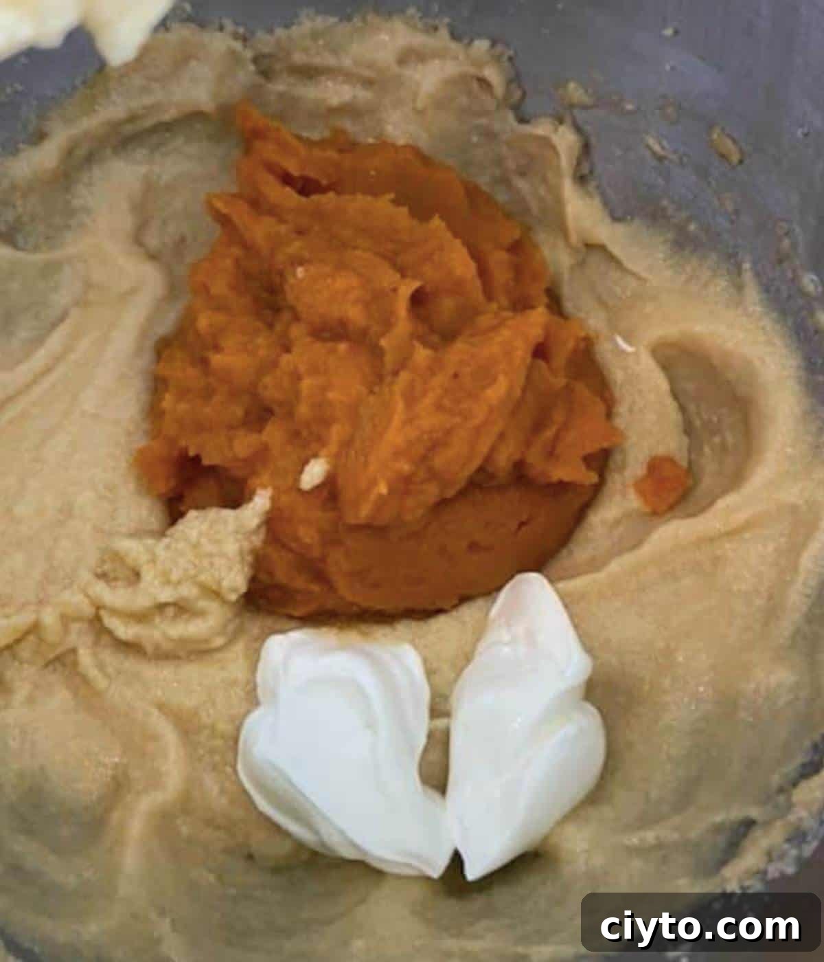 Moist Pumpkin Bread with Cream Cheese Frosting 8 Wet ingredients for pumpkin bread in stand mixer.