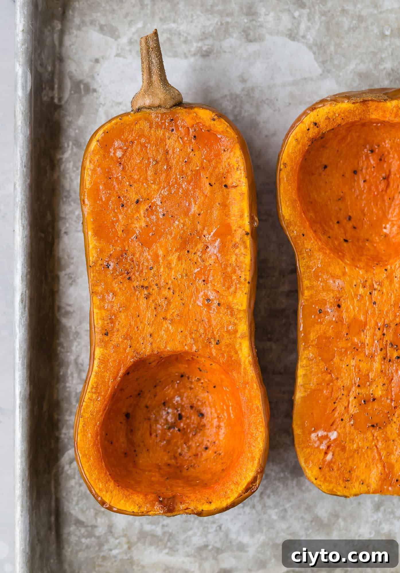 Roasted butternut squash halves.