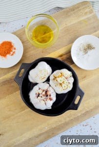 Garlic bulbs placed in a pan for smoking