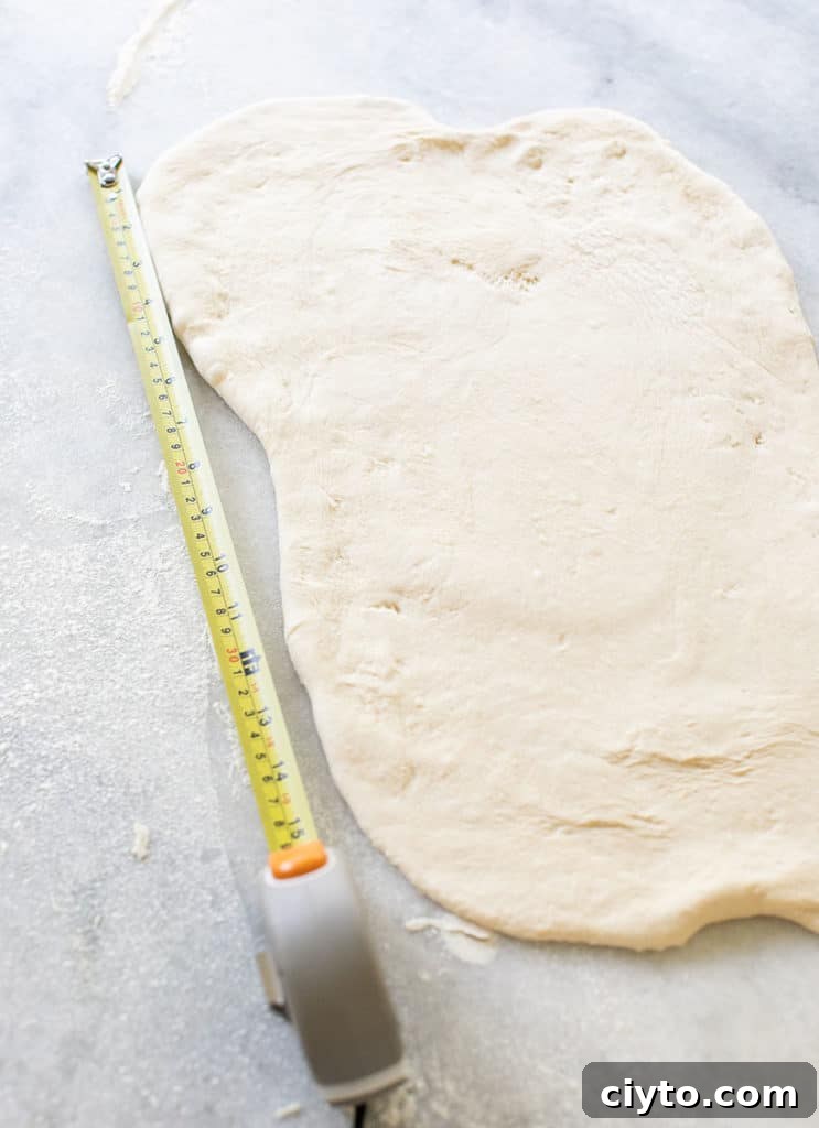 Roll the dough to 15" long when making cinnamon rolls.