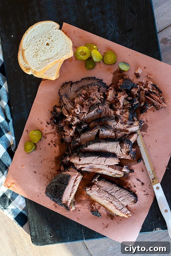 platter of smoked brisket cooked on the Ninja Woodfire Grill.