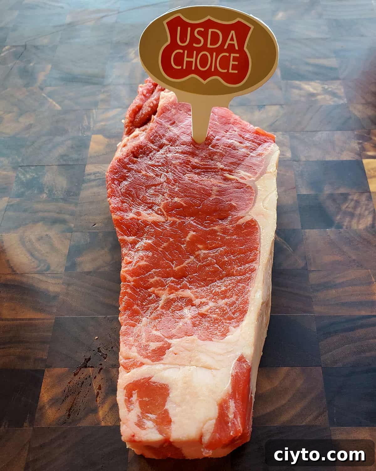 USDA graded choice steak with minimal marbling.